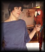 Hanna with Ruben, the Green-Wing Macaw, owned by client, J.Wolfe.